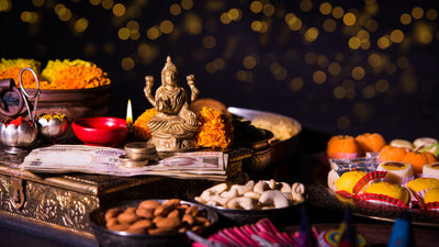 Beautiful Shubh Diwali home decorations with traditional diyas, colorful rangoli and marigold garlands 